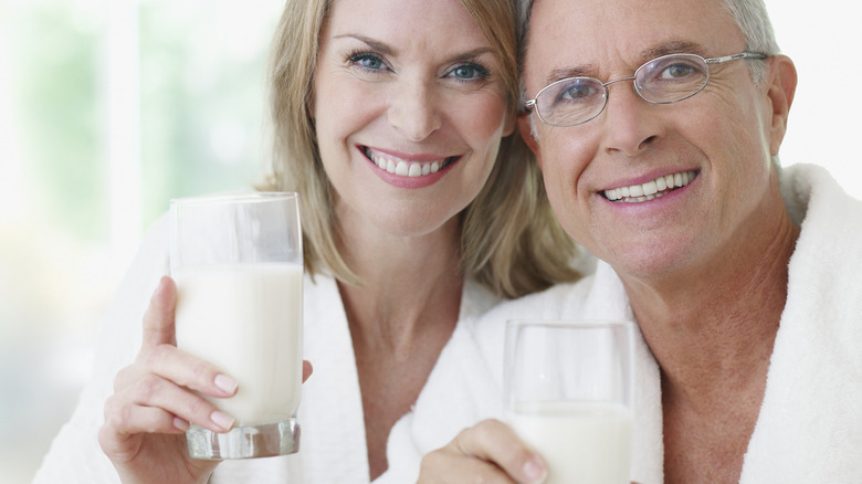 older couple drinking milk
