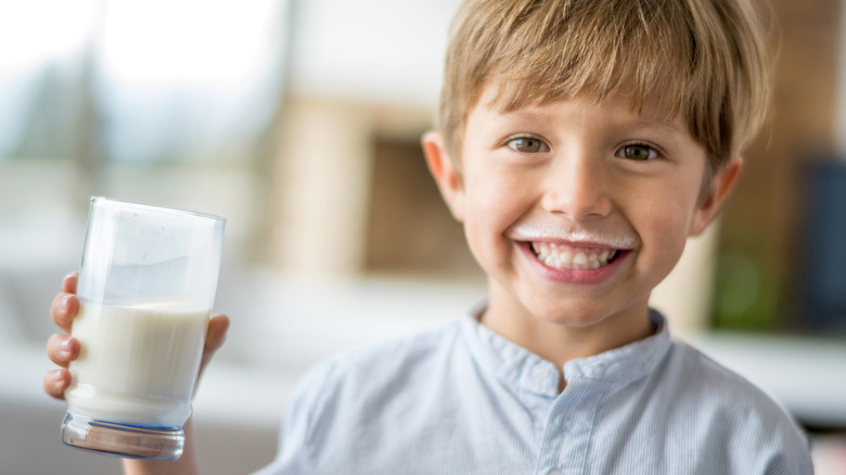 young boy with a milk mustache