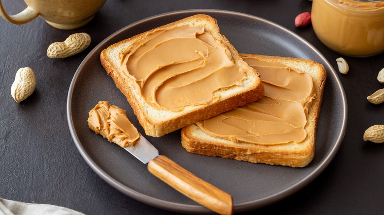 peanut butter on two pieces of white bread