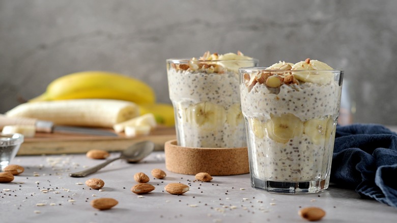 Two servings of overnight oats made with chia seeds, bananas, and almonds