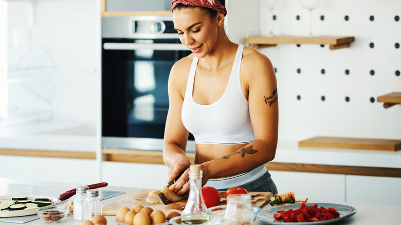 Woman cooking protein