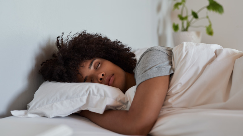 woman sleeping in bed