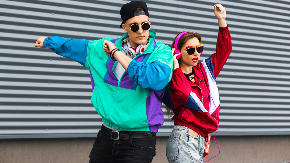 90s man and woman in windbreakers