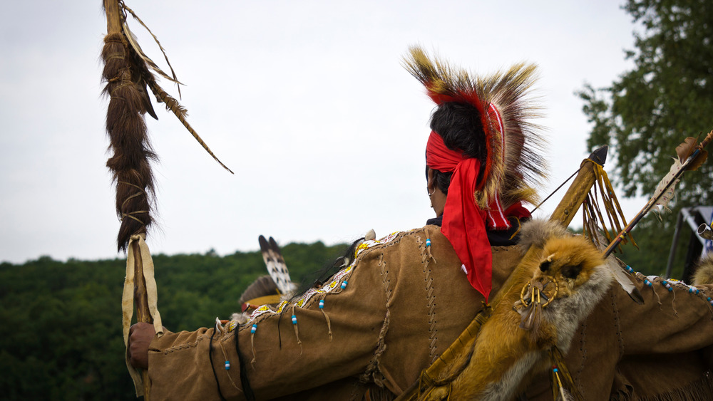 native american in traditional clothes
