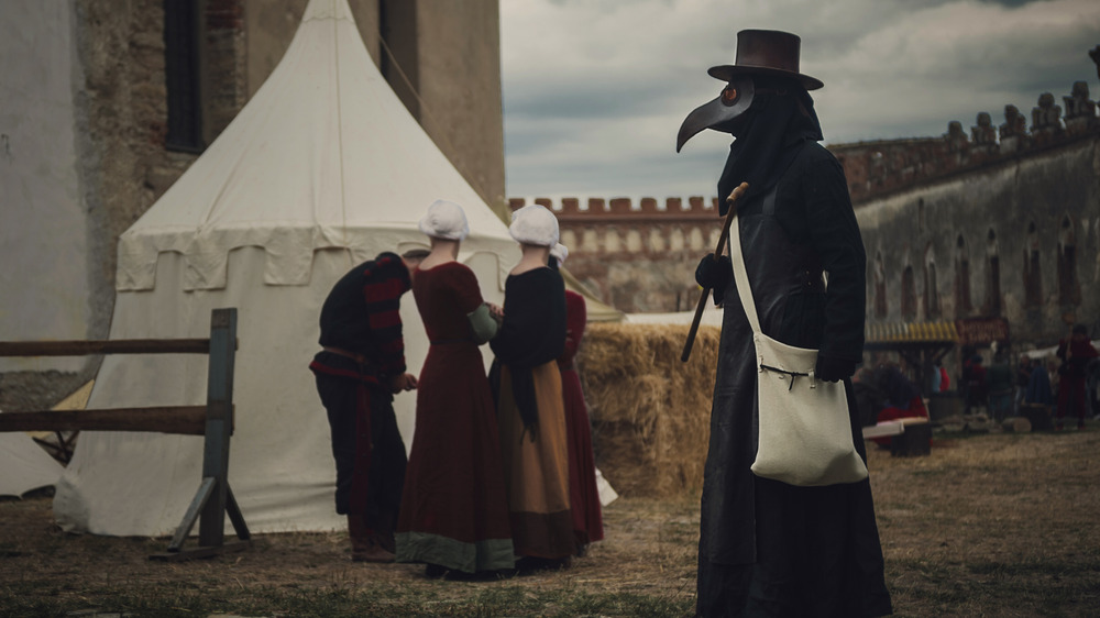plague doctor in medieval setting