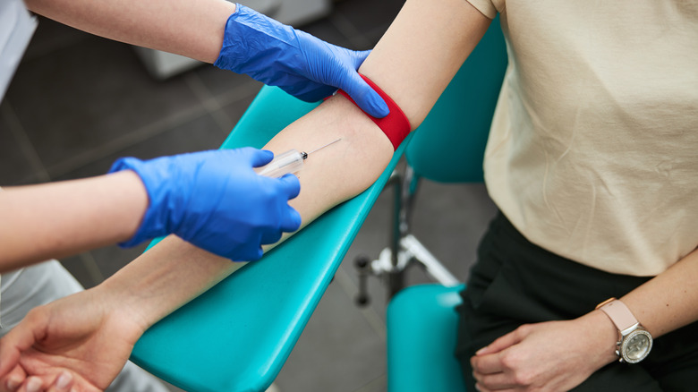 person receiving a blood draw