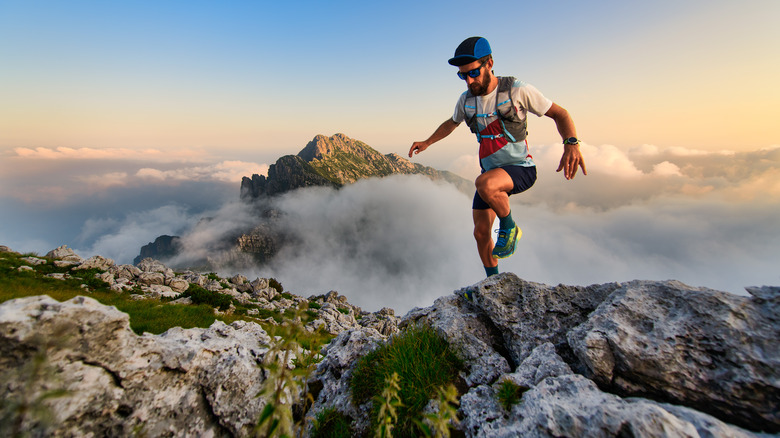 An ultra runner on top of a mountain 