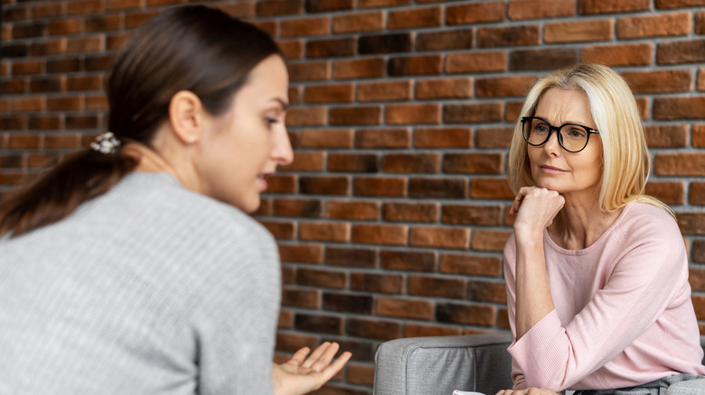 Girl consulting with psychiatrist