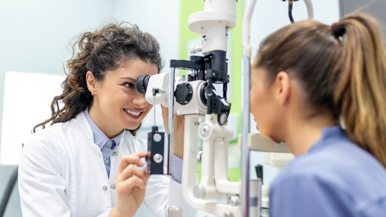 optometrist with patient