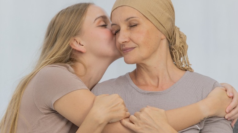 Daughter supports mother during chemotherapy 