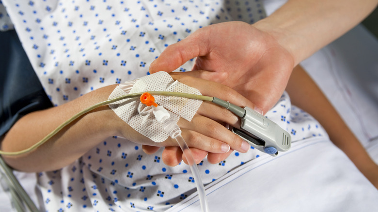 A patient in intensive care unit recieving treatment