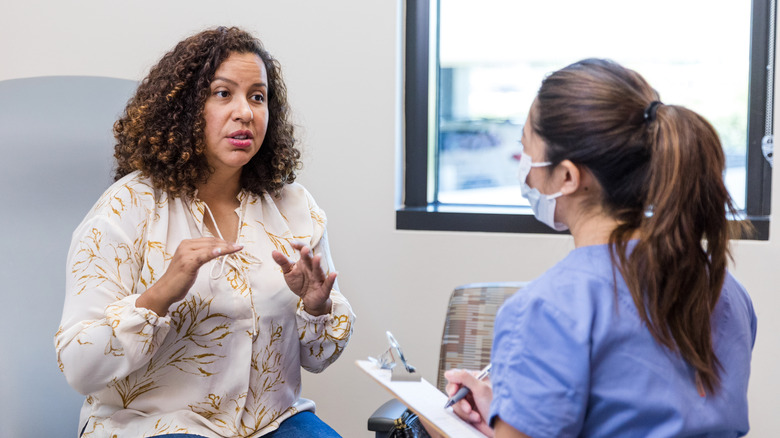 woman talking to a medical professional