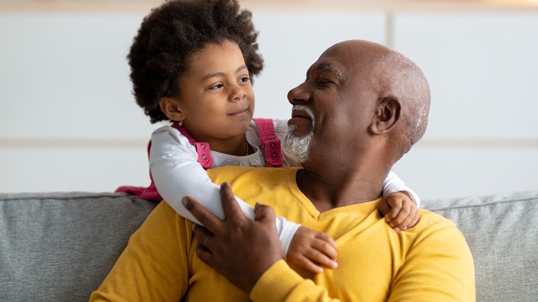 Older gentleman with grand daughter