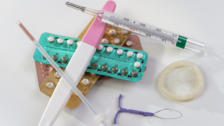 birth control methods stacked in pile