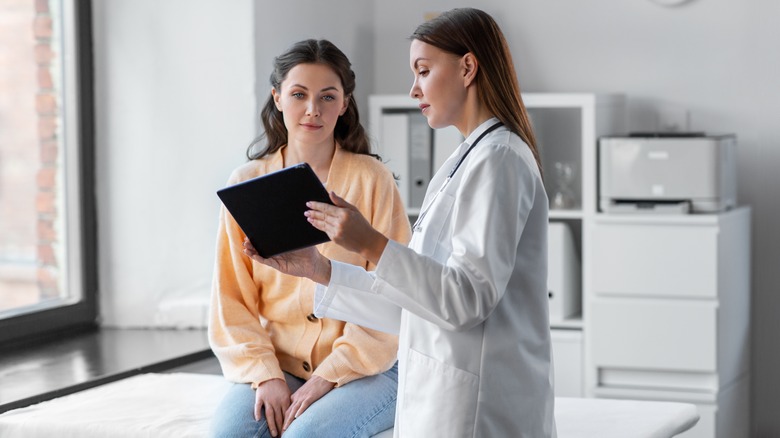 woman and doctor talking