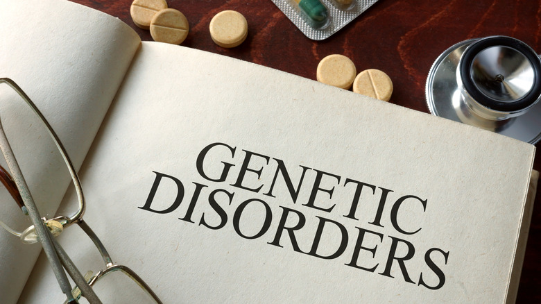 A book open to a genetic disorders section