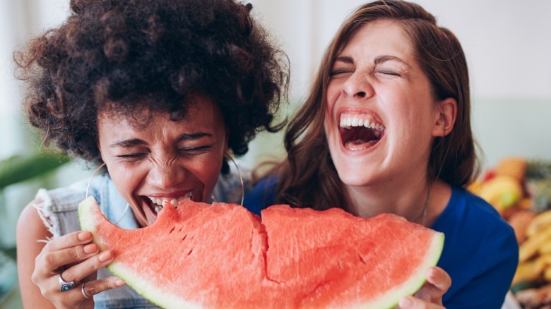 friends sharing watermelon