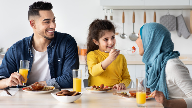 family eating a meal together 