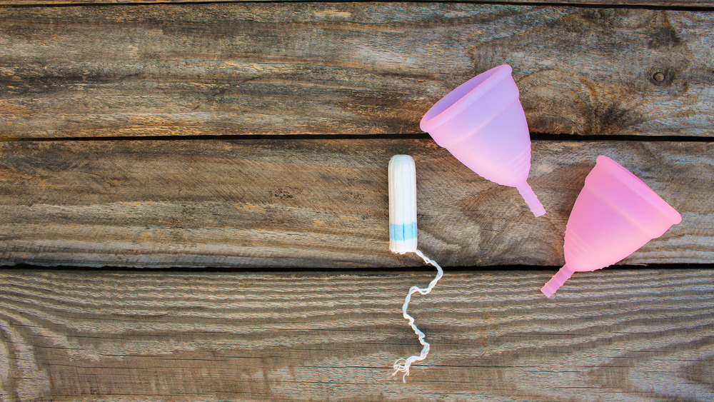 Tampon and two menstrual cups