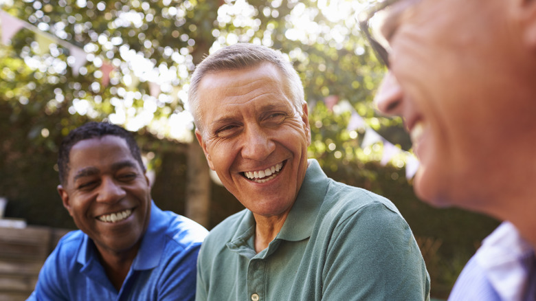 older males talking outside