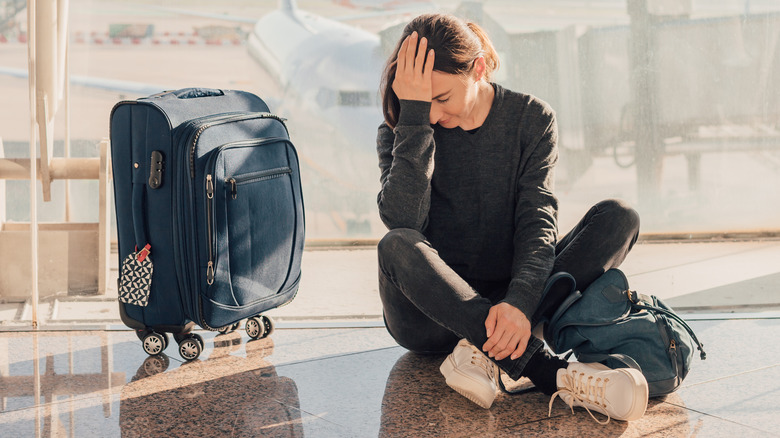 Tired woman in airport