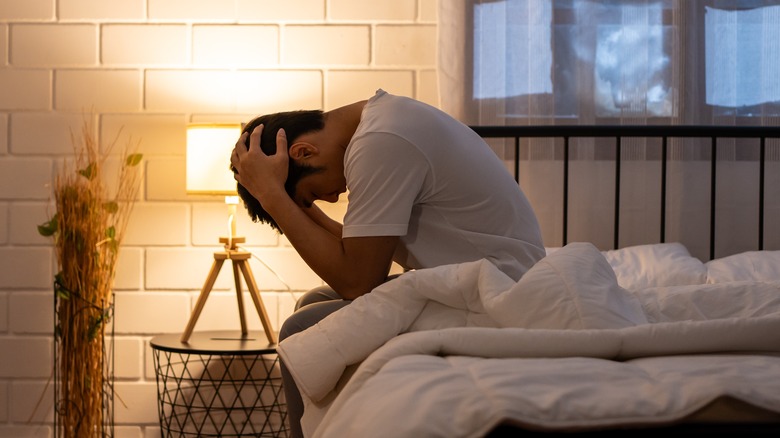 frustrated man in bed