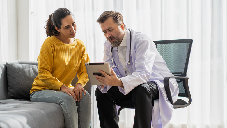 woman visiting doctor for consultation