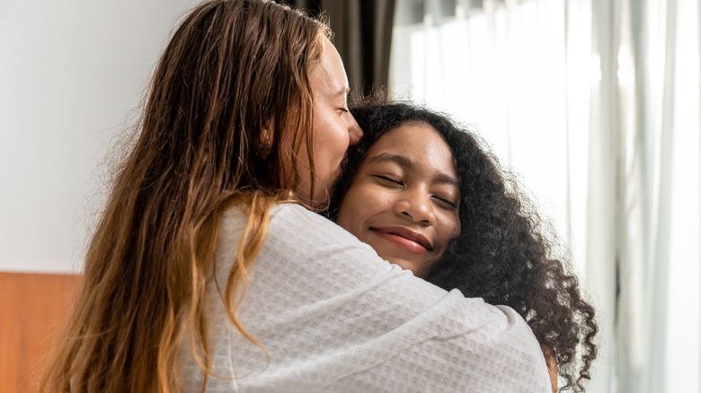 lesbian couple embracing