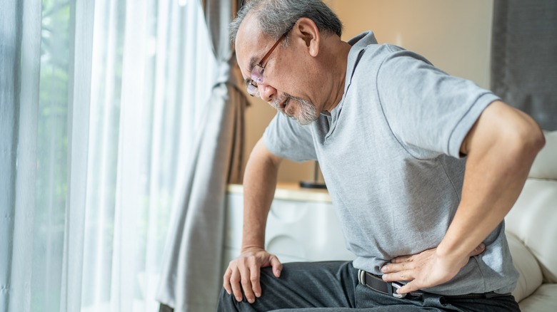 Older man suffering from a stomachache