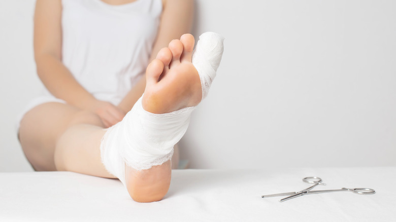 Bandaged frostbite on foot and toes