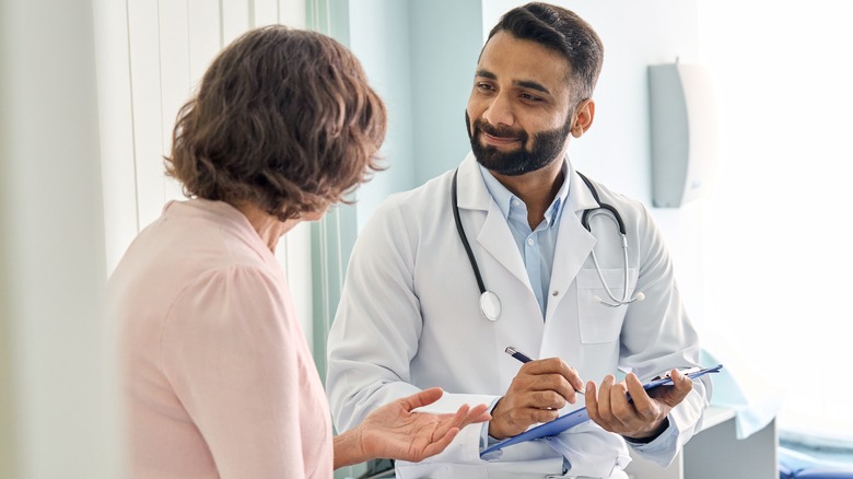 patient consulting with doctor