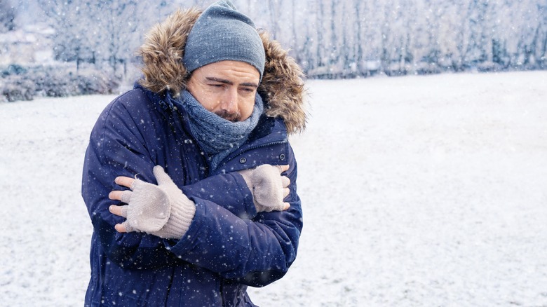 Man in winter gear shivering