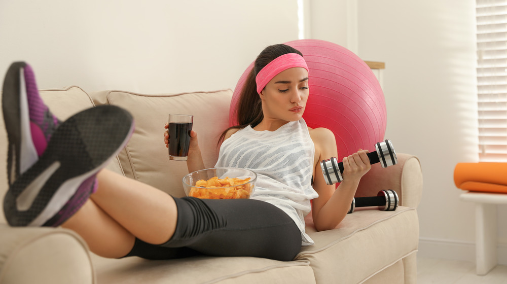 sedentary athlete on couch