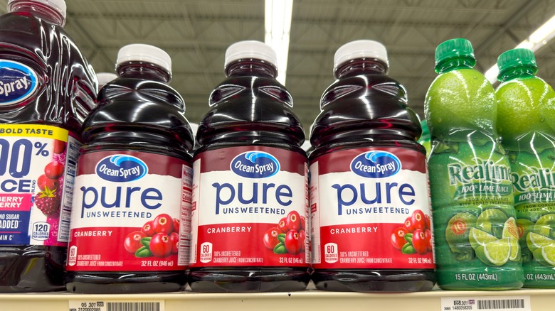 Bottles of Ocean Spray cranberry juice on grocery store shelves