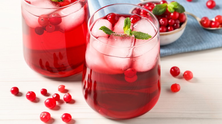 2 glasses of cranberry juice with ice