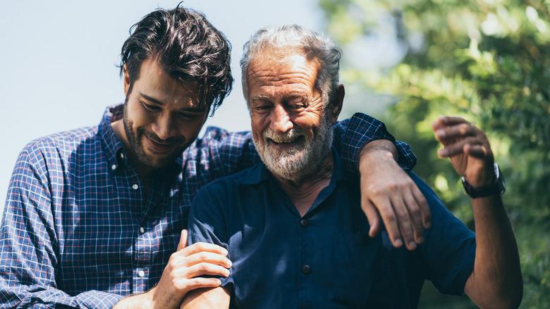 a bearded man with his bearded dad