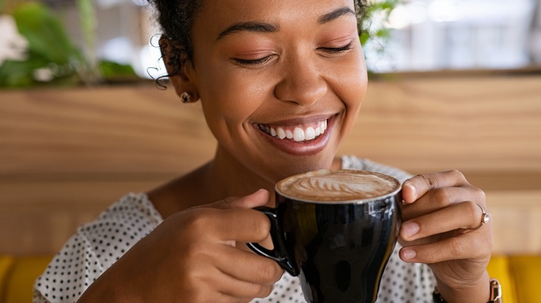 Woman enjoying a cup of coffee