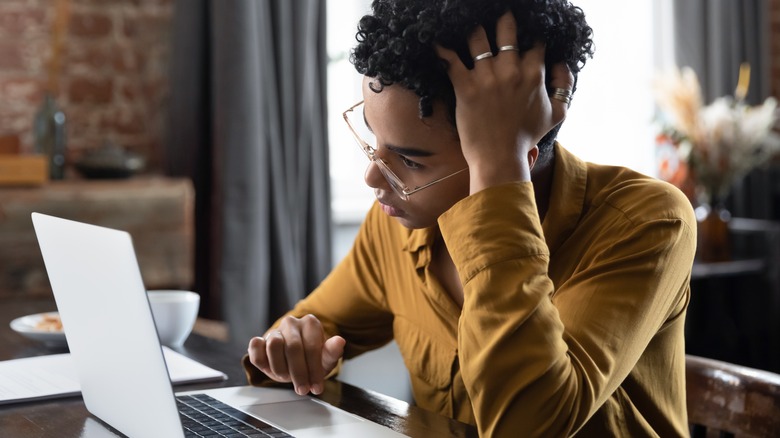 Woman working looking stressed