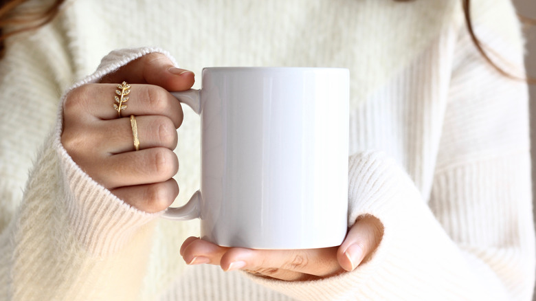 a woman drinking coffee