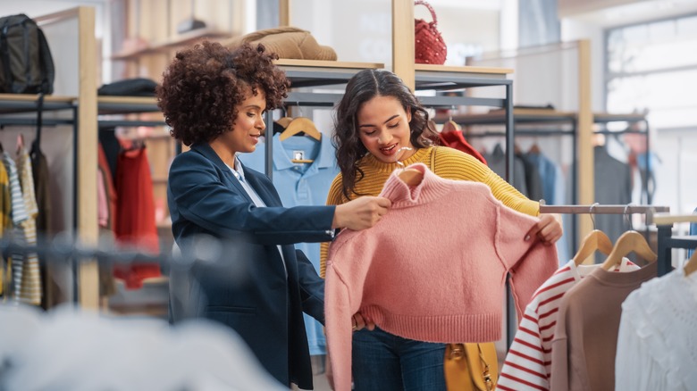 women shopping for loose clothing 