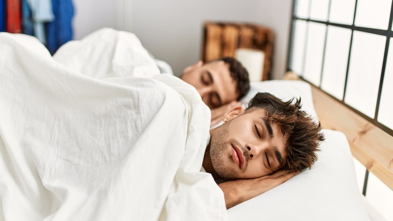 Male couple sleeping