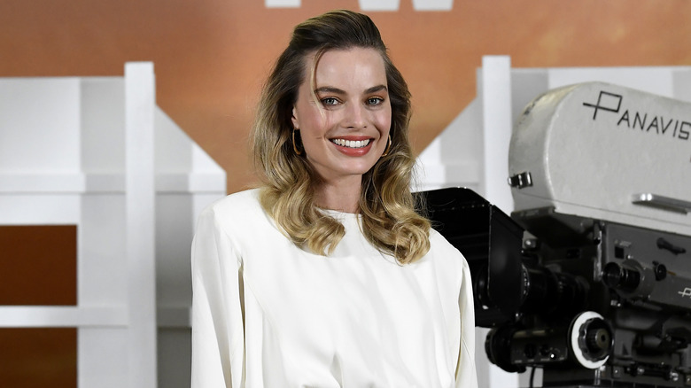 Margot Robbie smiling for the camera