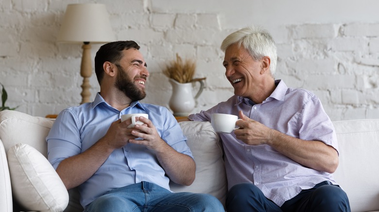 two men drinking tea