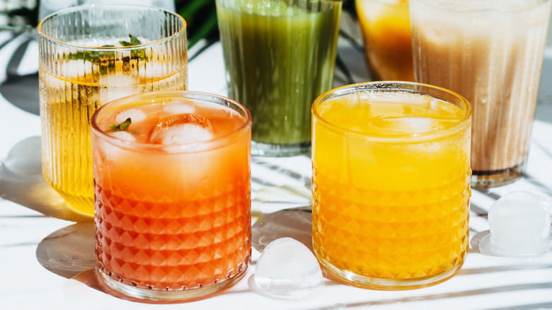 array of juices on a table