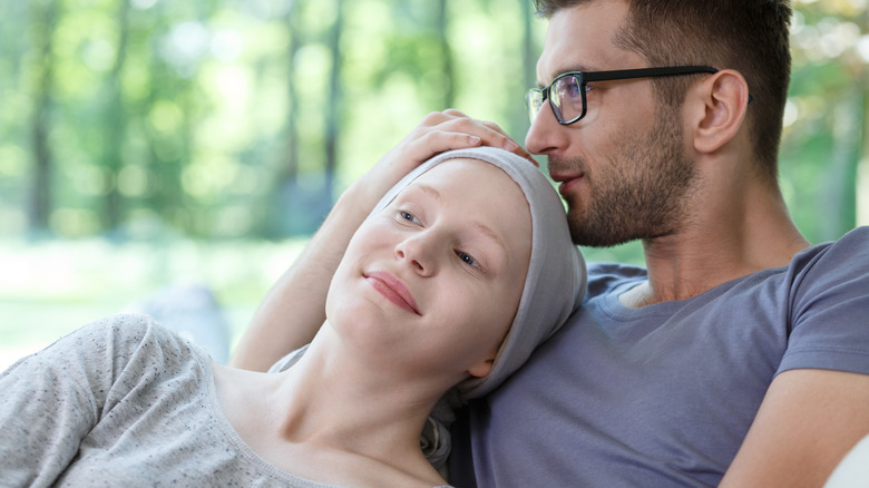 young hospice patient with husband