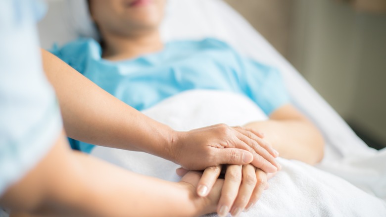 hospice patient smiling at loved one