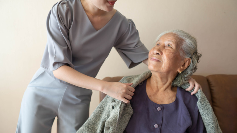 woman hugging sick family member