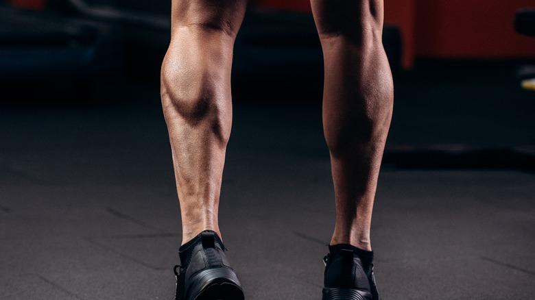 man's calf muscles closeup