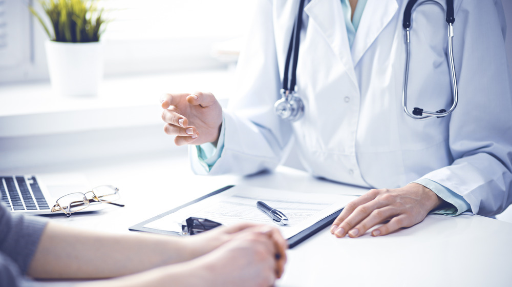 woman visiting a doctor