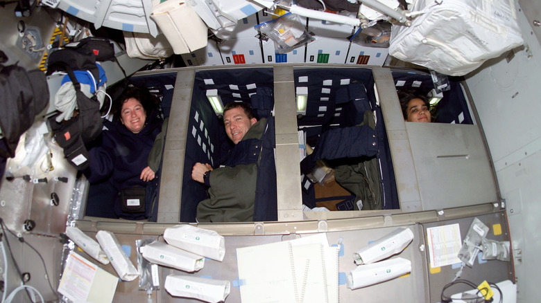 astronauts in bunk beds